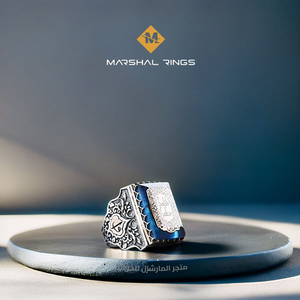 خاتم فضة رجالي 925 مرصع بحجر الكهرمان الأزرق منقوش يدوياً  - متجر المارشال للخواتم الرجالية 1