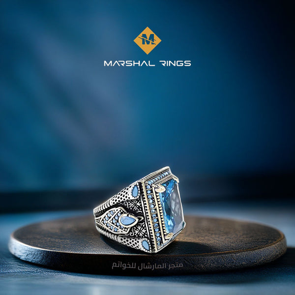 خاتم فضة رجالي مطلي روديوم 925 بحجر أكوامارين ولمسات ذهبية - متجر المارشال للخواتم الرجالية 1