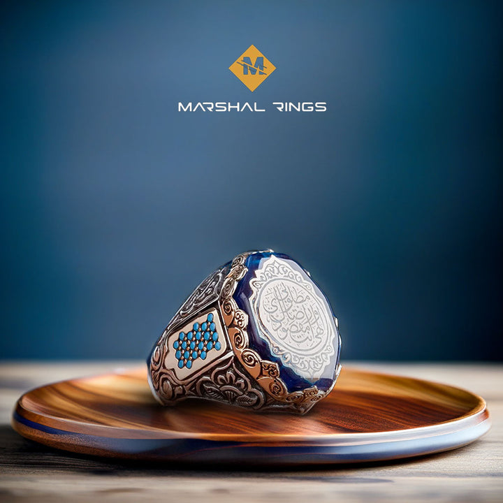 خاتم فضة 925 رجالي مرصع بحجر الكهرمان الأزرق بنقش "إلهي أنت مقصودي ورضاك مطلوبي" - متجر المارشال للخواتم الرجالية 1