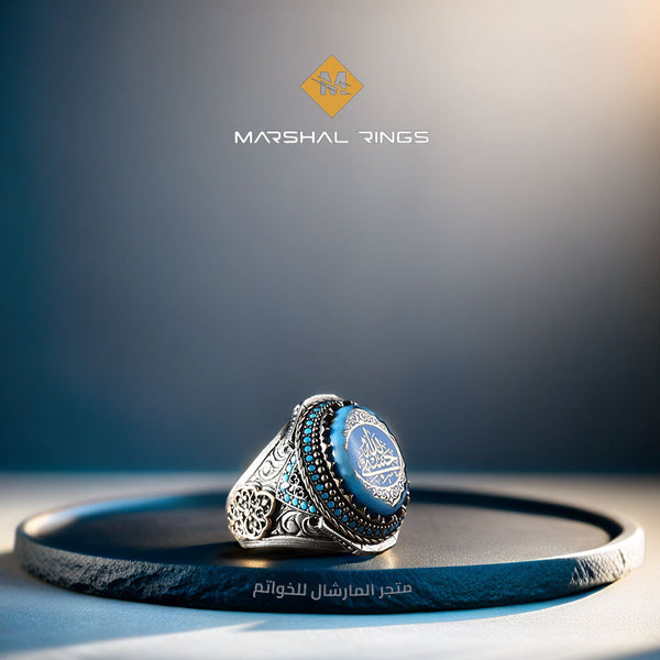 خاتم فضة رجالي 925 مرصع بحجر الفيروز منقوش يدوياً ومزين بعبارة "حسبي الله" - متجر المارشال للخواتم الرجالية 1